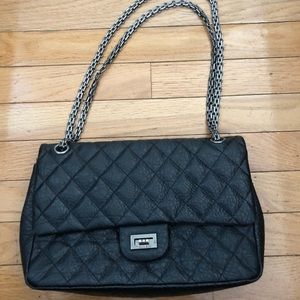 Black leather quilted bag with chain handle